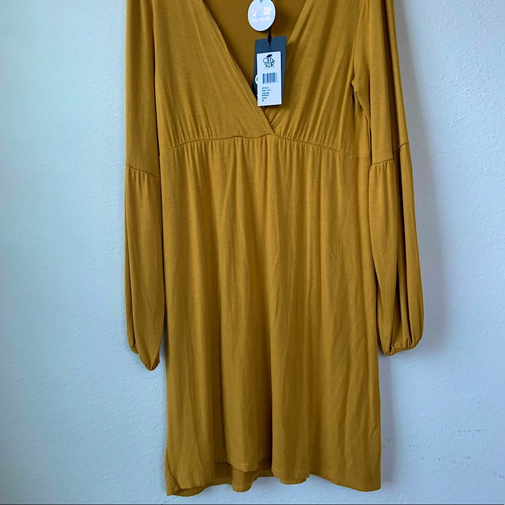 Mustard t-shirt material dress. TAGS STILL ON!